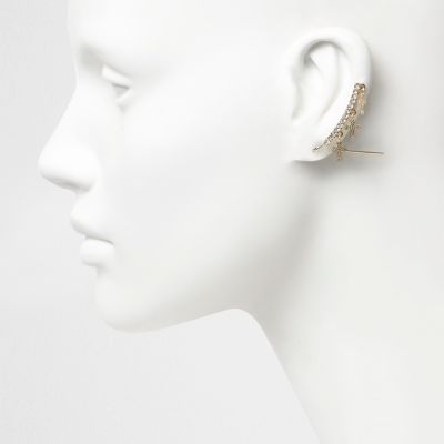 Gold tone cross diamante cuff earrings